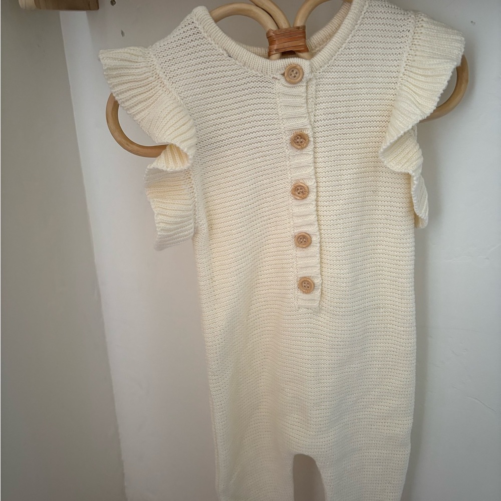 Cream Knit Baby Romper with Ruffle Sleeves